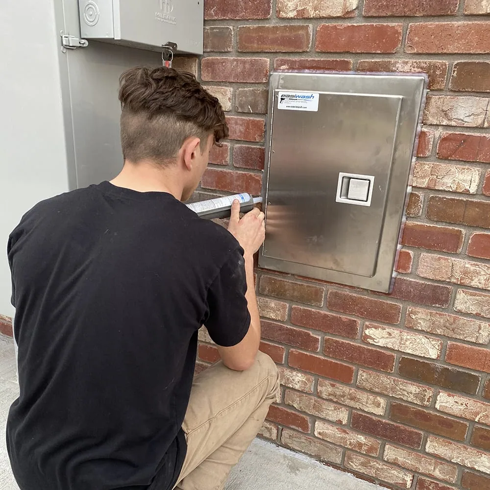 Easiwash technician completing a centralized back-of-house installation